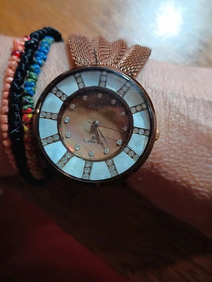 Wristwatch women's like new with unique metal brown strap