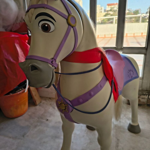 Jakks Pacific Maximus rocking horse toy with sounds used, colorful