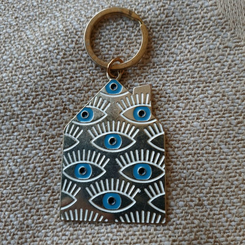Keychain charm "mati" like new, metal with blue eyes