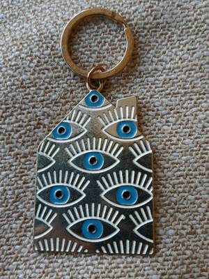 Keychain charm "mati" like new, metal with blue eyes