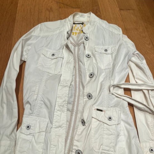 White jacket used size M with stains on sleeves