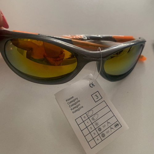 Oakley sunglasses, orange with gold lime chameleon lenses