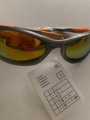 Oakley sunglasses, orange with gold lime chameleon lenses