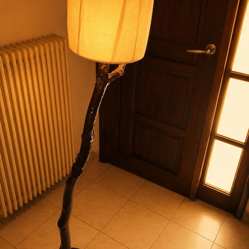 Rustic wooden floor lamp with natural tree trunk and dusty rose cable