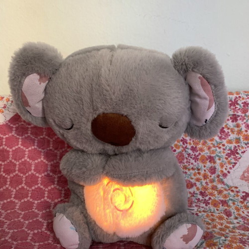 Relaxing plush koala with breathing mechanism