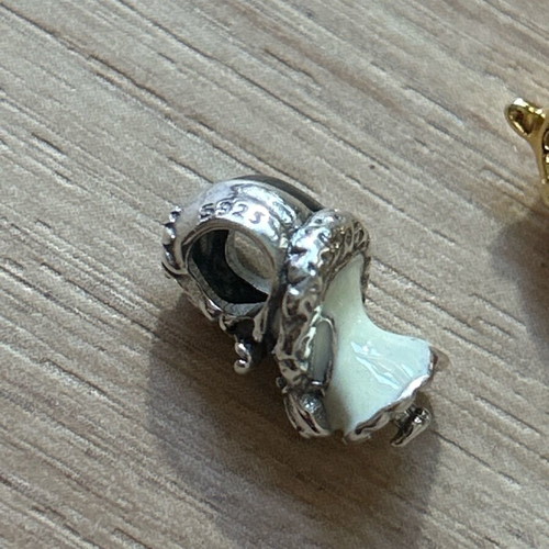 Winnie the Pooh and Cruella de Vil charms used, silver set of 2