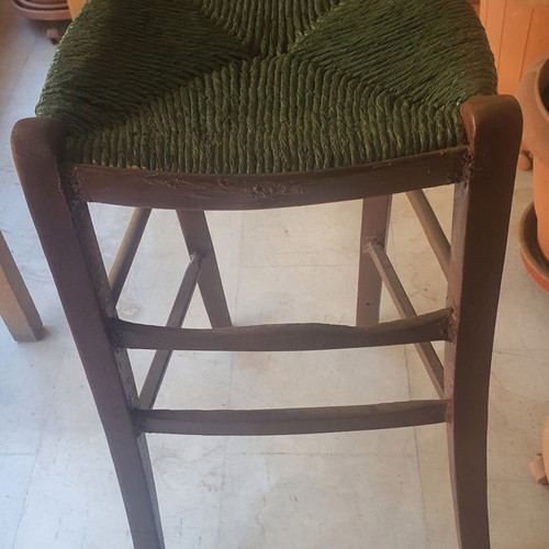Wooden high chair with woven seat
