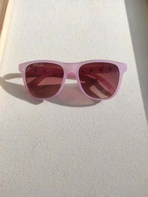 Purple sunglasses used with case