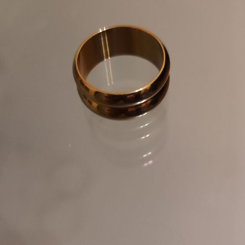 Gold-colored stainless steel ring new, size 8