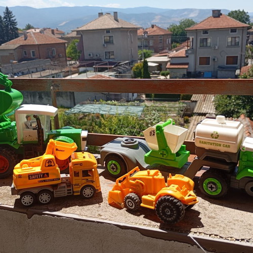 Children's construction and specialized toy trucks set of 4 used