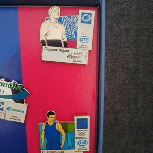 Athens 2004 pins in collectible case like new