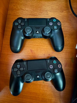 PlayStation 4 Pro 1TB console like new with 2 controllers