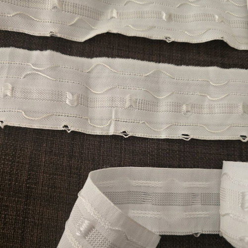 Curtain tapes and wide black elastic like new