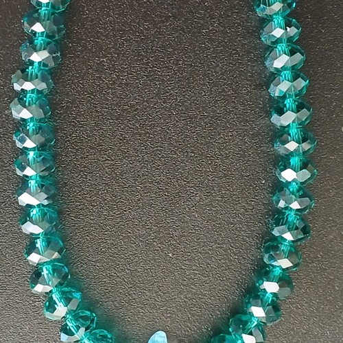 Bracelet with crystal beads used, emerald/petrol color with fish motif