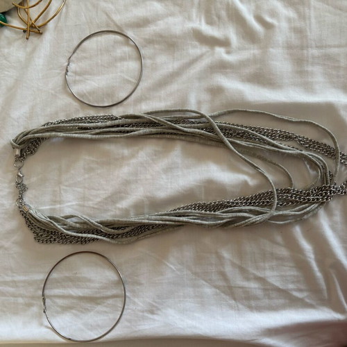 Necklace with rings and gray fabric like new