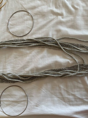 Necklace with rings and gray fabric like new