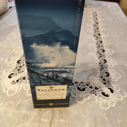 Talisker whiskey collectible empty bottle and Aura water bottle used