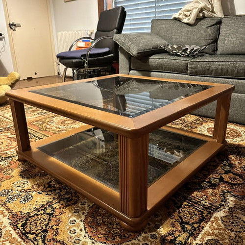 Set of two wooden square coffee tables with glass tops