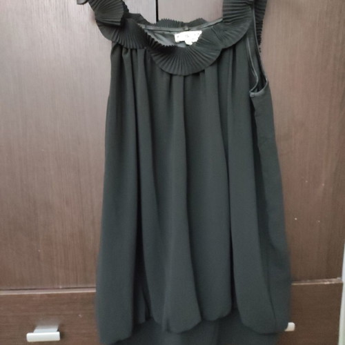 Black sleeveless wide blouse used, size medium-large