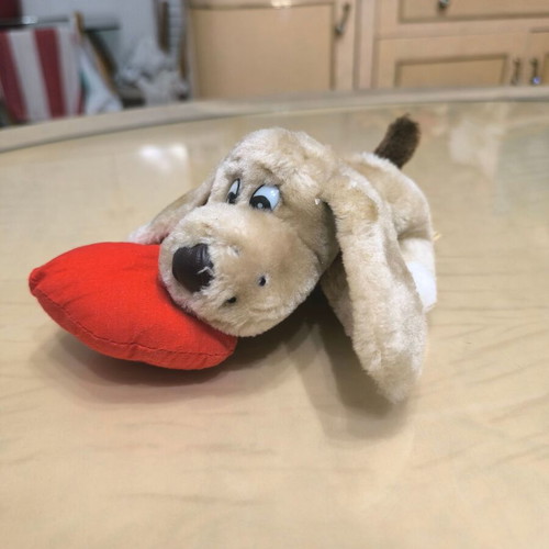 Plush dog with red heart like new