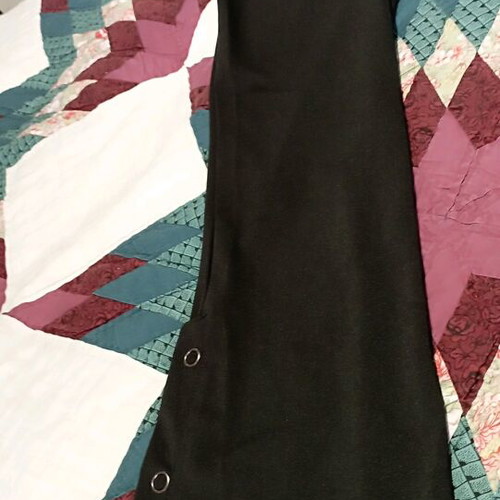 Black pants like new with buttons at the hem
