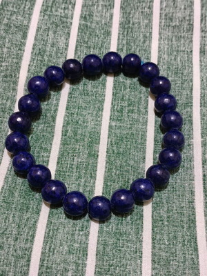 Bracelet with dark blue beads new with elastic band