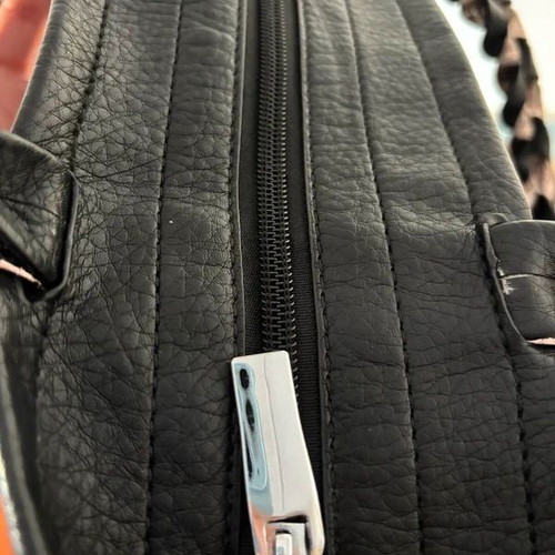 Black shoulder bag tote style like new with inner pockets and silver handle detail