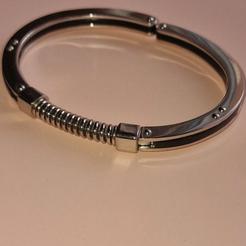 Men's steel handcuff bracelet like new, black and silver