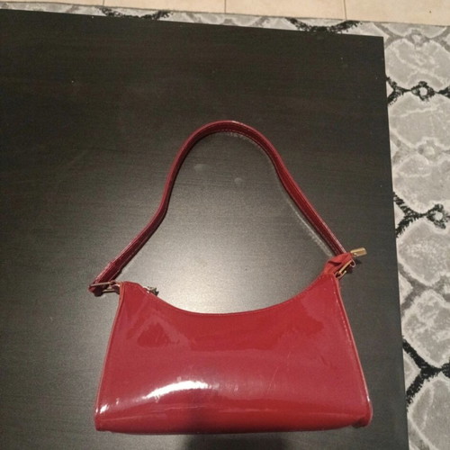 Red shoulder bag used, suitable for evening walk
