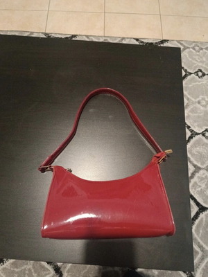 Red shoulder bag used, suitable for evening walk