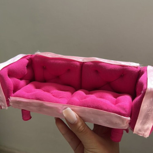 Dolls and doll sofa like new