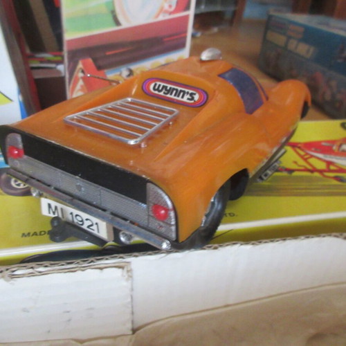 Porsche trailer and battery-operated boat from the 70s, new in box