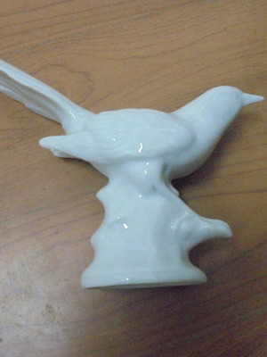 Porcelain bird figurine used, elegant decoration