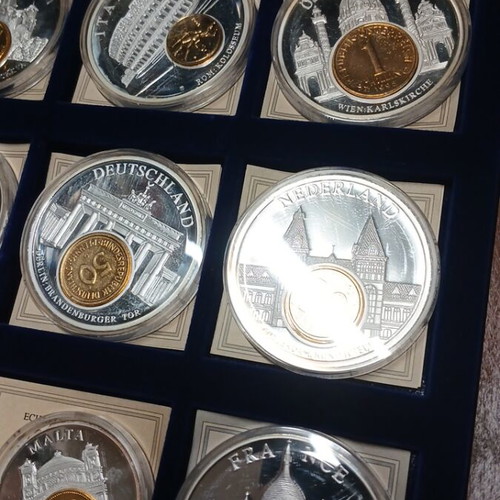 European coin collection with silver and gold-plated medals, pre-euro