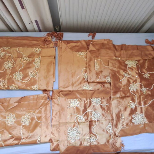 Set of 7 orange decorative table linens with embroidered flowers and beads