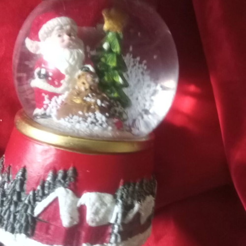 Christmas souvenir like new with Santa Claus and falling snow