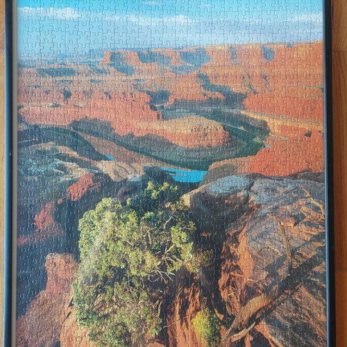 Framed puzzle like new, dimensions 0.53x0.73 m