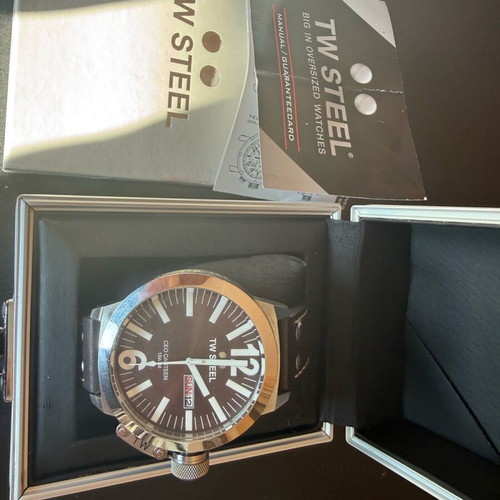 TW Steel watch used with brown strap and date display