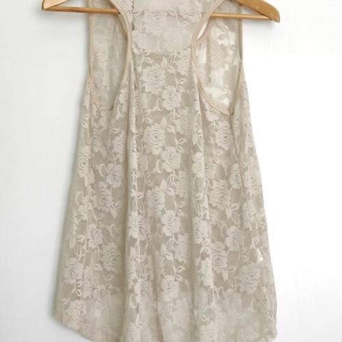 Lace blouse beige size L like new with sporty back and asymmetric style