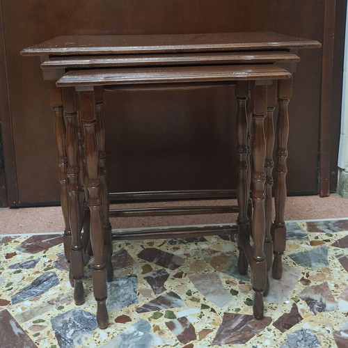 Set of three vintage wooden nesting tables, dark honey color