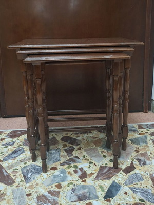 Set of three vintage wooden nesting tables, dark honey color
