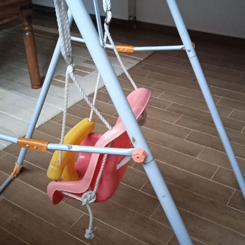 Garden swing used with intact ropes and stable frame