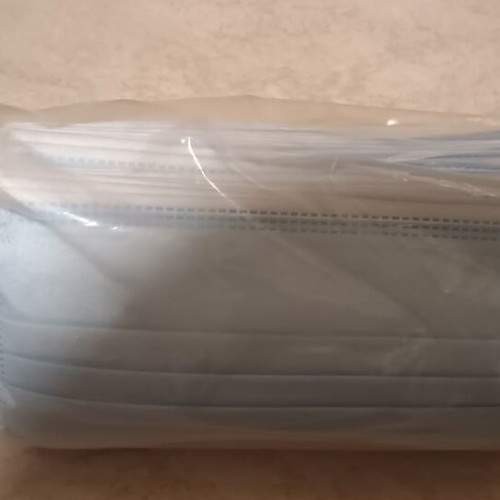 Set of 50 disposable medical masks with ear loops sealed