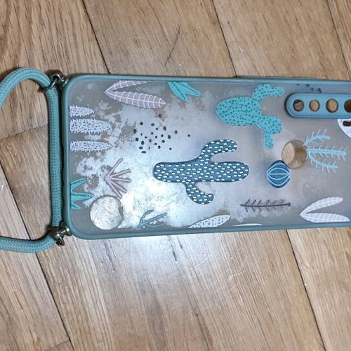Hanging phone case used with cactus design in greenish color