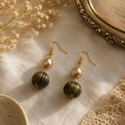 Golden Vintage dangling earrings with pearl and bronze beads