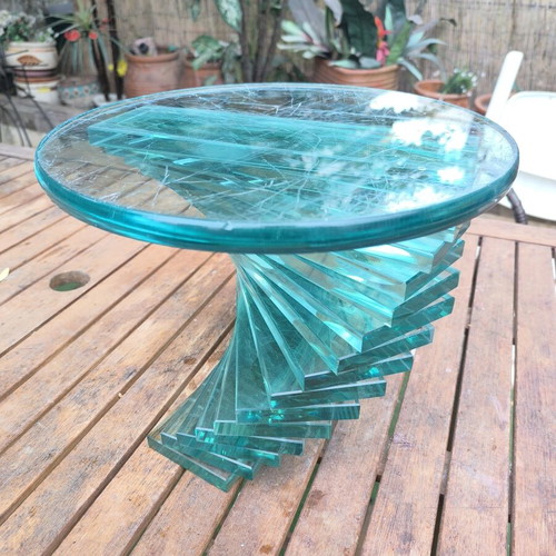 Round coffee table used with glass spiral base