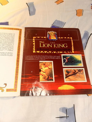 The Lion King Panini album used with 62 stickers