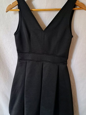 Little black dress scuba type like new, black dress with V neckline