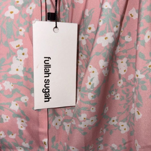 Fullah Sugah summer jumpsuit with open back, pink and white