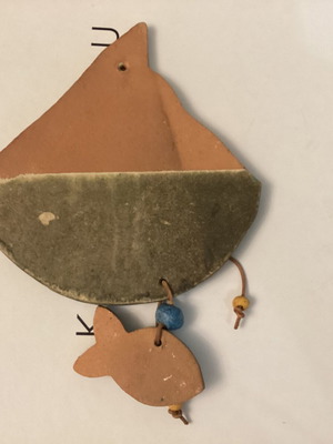 Ceramic hanging boat with fish wall decor